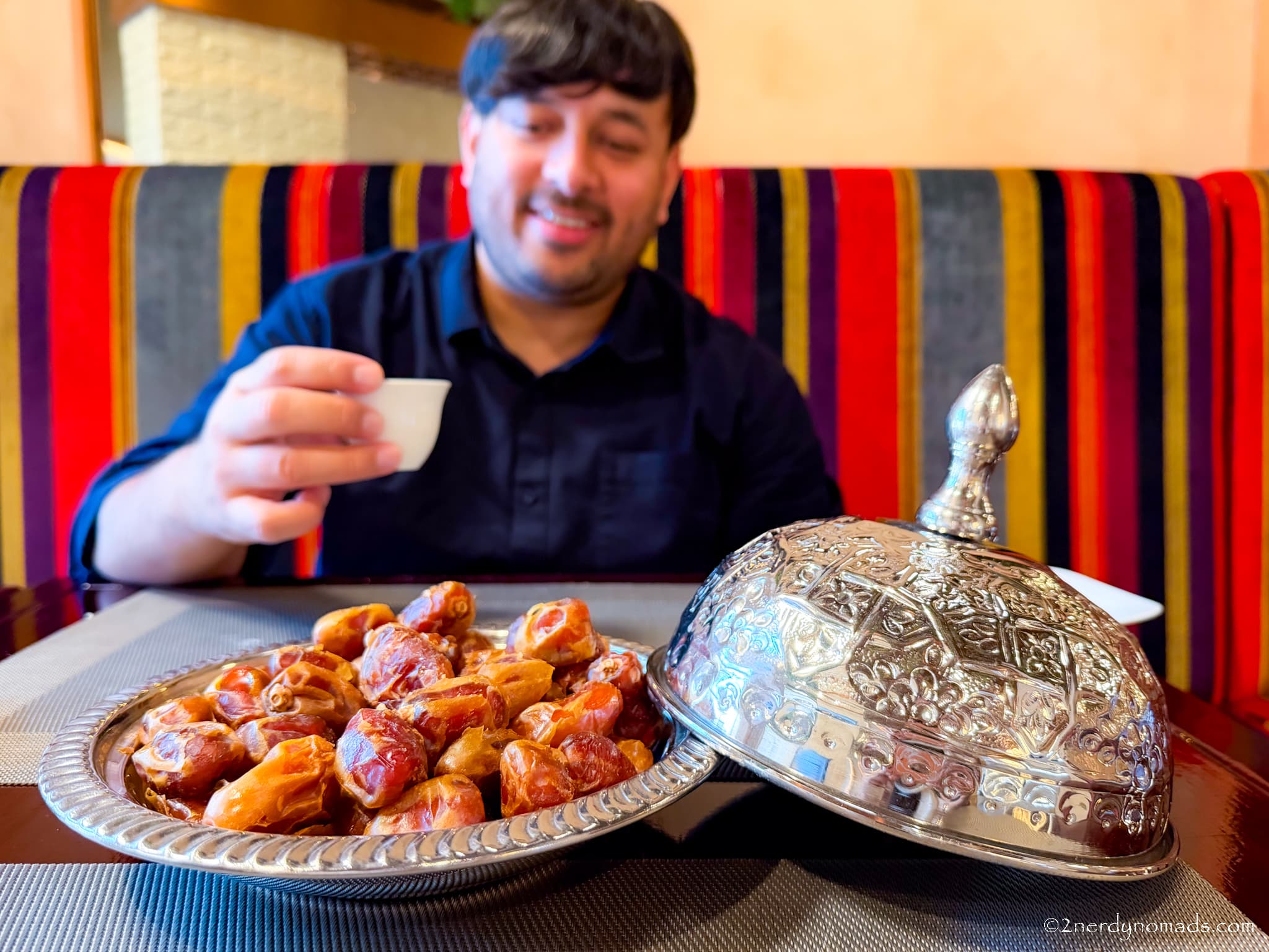 Traditional Omani dates served with Arabic coffee, a welcoming hospitality tradition in Oman.
